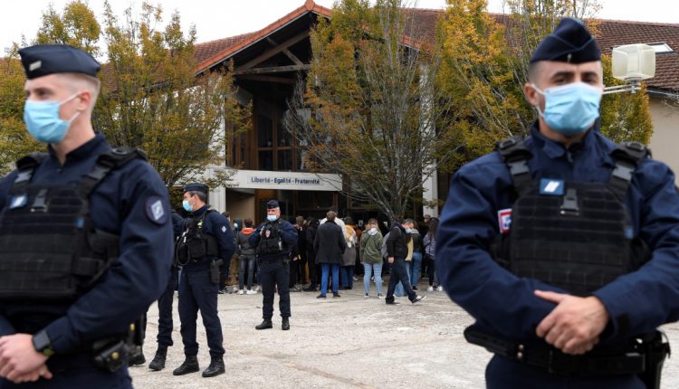 Police arrest nine after teacher beheaded in Paris suburb | France