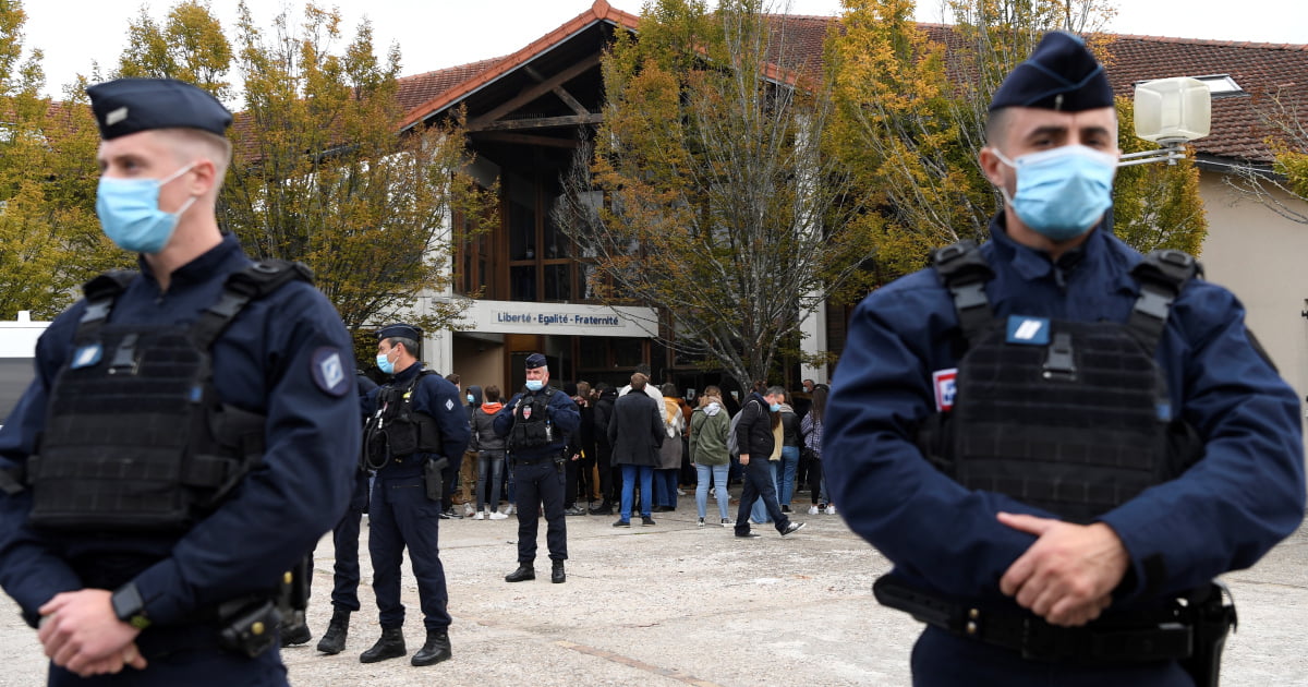 Police arrest nine after teacher beheaded in Paris suburb | France