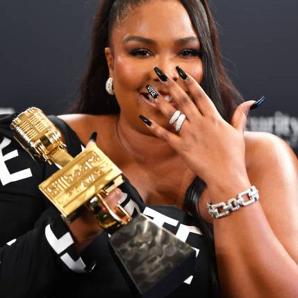 Lizzo Encourages Everyone To Use Their "Power" While Accepting Billboard Music Award For Top Song Sales Artist (Video)