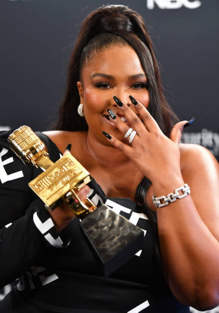 Lizzo Encourages Everyone To Use Their "Power" While Accepting Billboard Music Award For Top Song Sales Artist (Video)