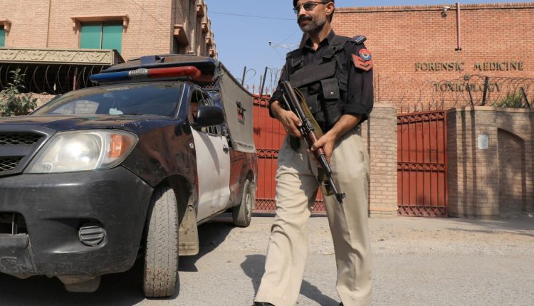 Pakistan police look for suspects after Ahmadi professor killed | Pakistan