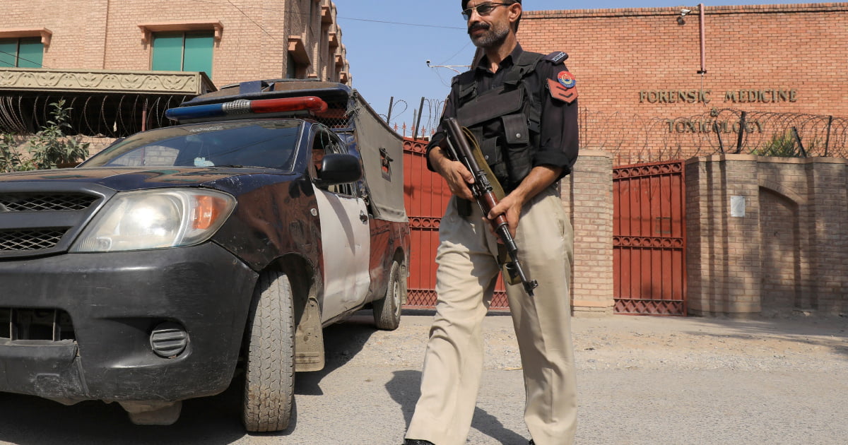 Pakistan police look for suspects after Ahmadi professor killed | Pakistan