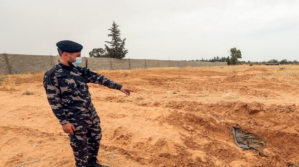 Twelve bodies found in Libya mass graves | Middle East