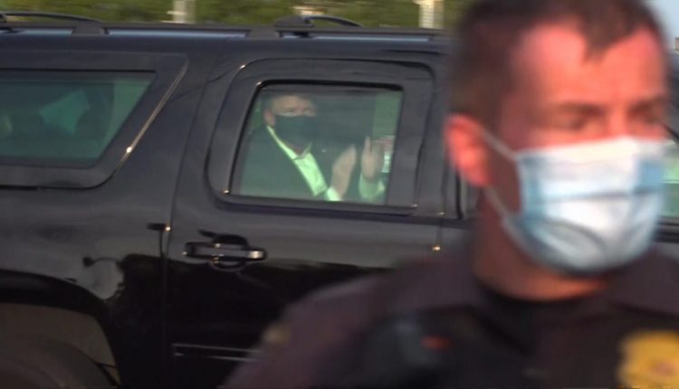 Trump briefly leaves hospital to greet supporters