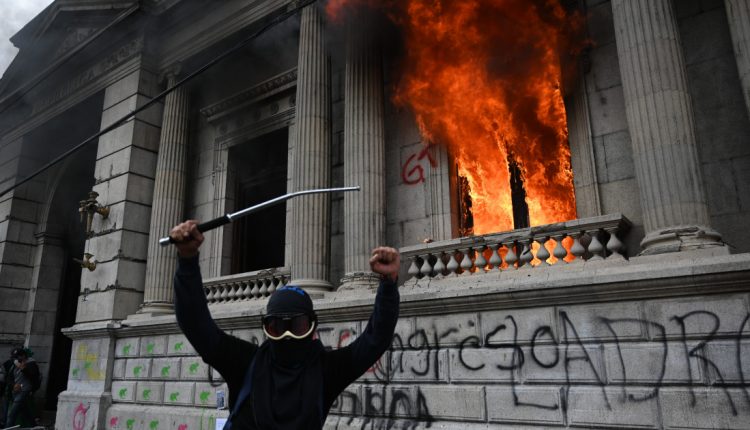 Guatemala protesters torch Congress as simmering anger boils over | Latin America