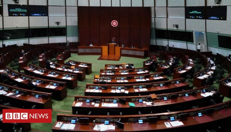 Hong Kong disqualifies four pro-democracy lawmakers after China ruling