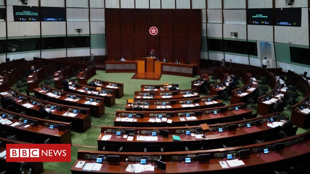 Hong Kong disqualifies four pro-democracy lawmakers after China ruling