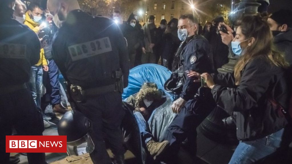 Paris police in 'shocking' clash at migrant camp