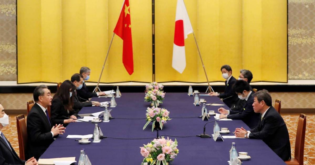 China’s Wang meeting Suga in first high-level talks with Japan PM | China