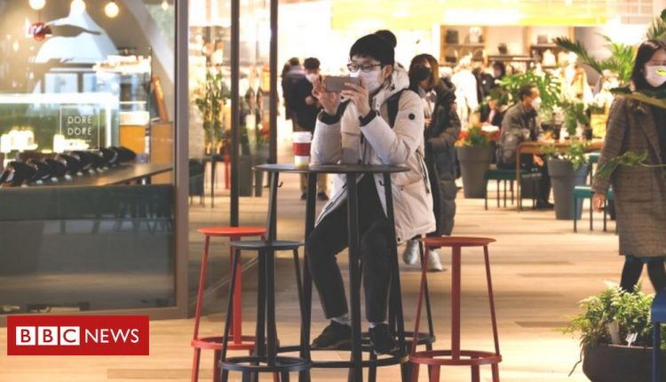 Covid: South Korea raises alert level amid spike in cases