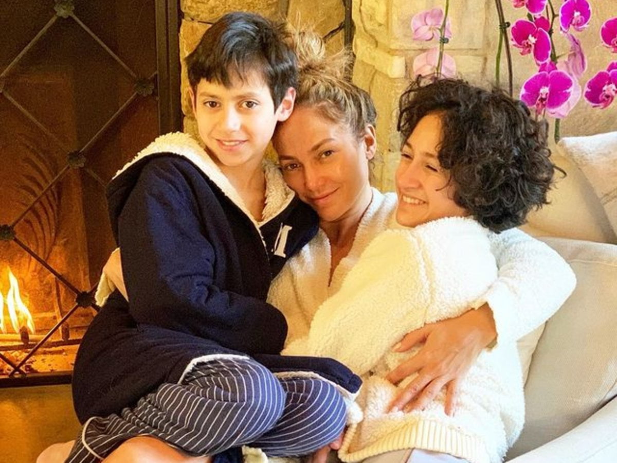 Jennifer Lopez Snuggles Her 12-Year-Old Twins Max And Emme Muniz While Wearing A Creamy, Cozy Robe