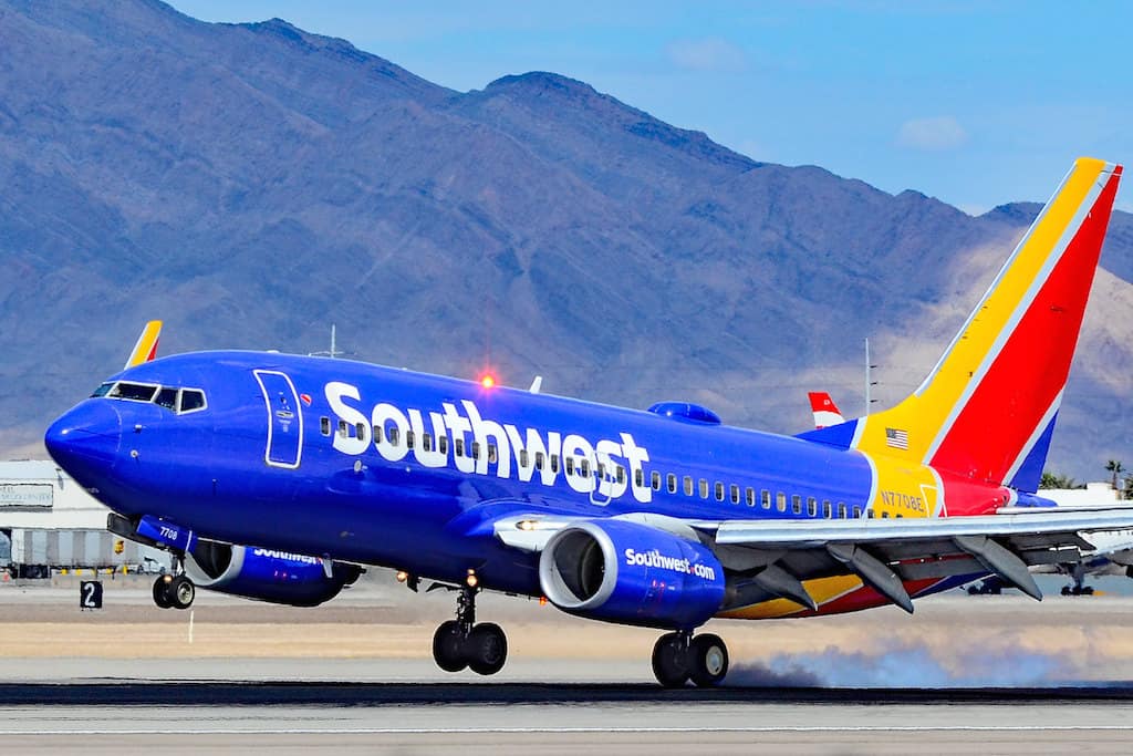 Southwest Airlines Employee Gifts Kids With Toys During Holiday Season