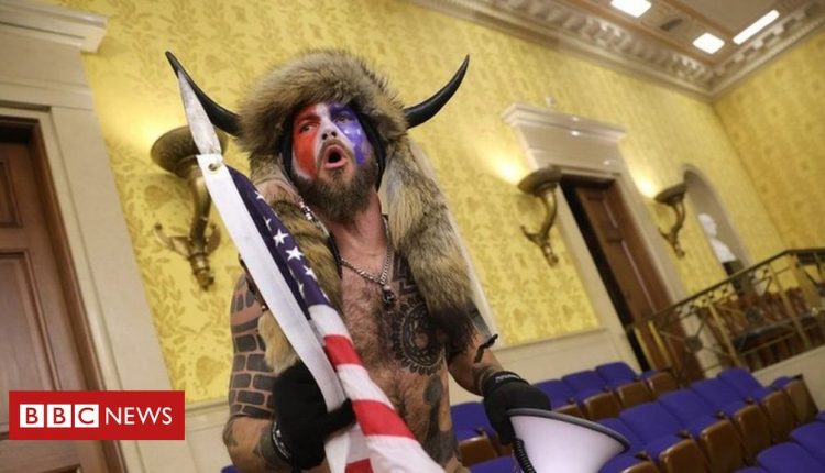 'QAnon Shaman' Jake Angeli charged over pro-Trump riots