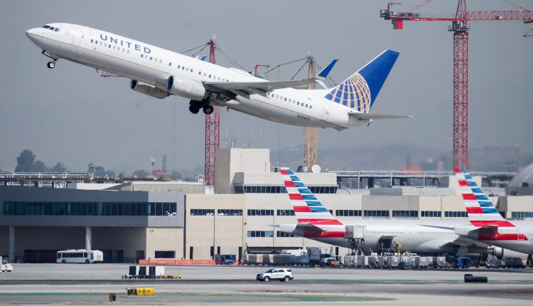 Debris From A United Airlines Plane Falls Into A Local Denver Community After The Plane Experiences Engine Failure